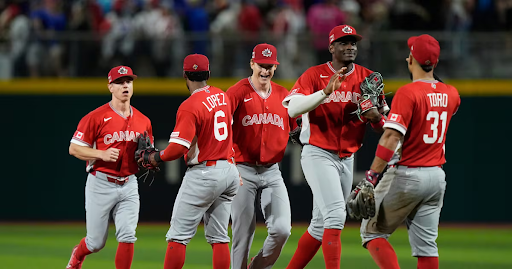 Team Canada celebrates at the WBC