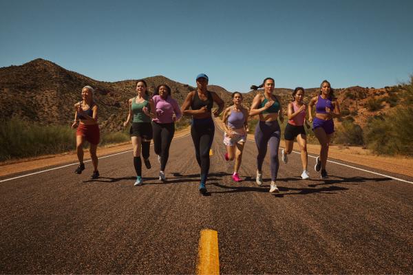 A group of women running on a road