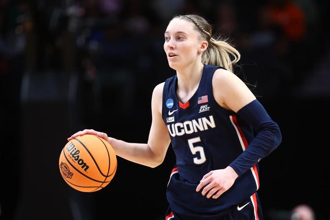 UConn’s Paige Bueckers dribbles the ball up the court.