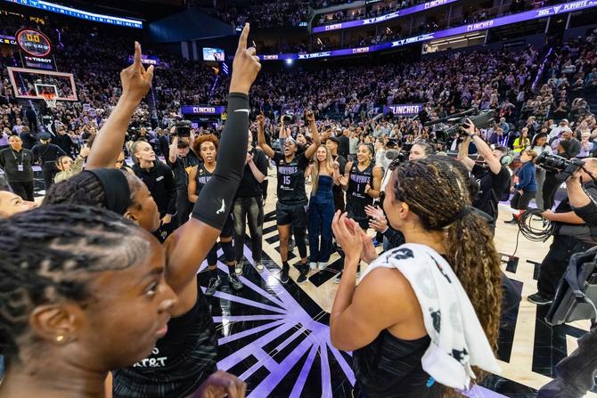 The Golden State Valkyries celebrate clinching a spot in the playoffs after their win against the Dallas Wings.