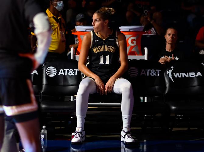 Washington Mystics player Elena Delle Donne sits on the bench