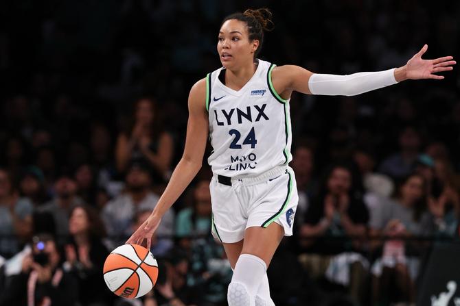 Napheesa Collier #24 of the Minnesota Lynx calls a play during the first half against the New York Liberty during Game Five of the WNBA Finals at Barclays Center on October 20, 2024 in New York City.