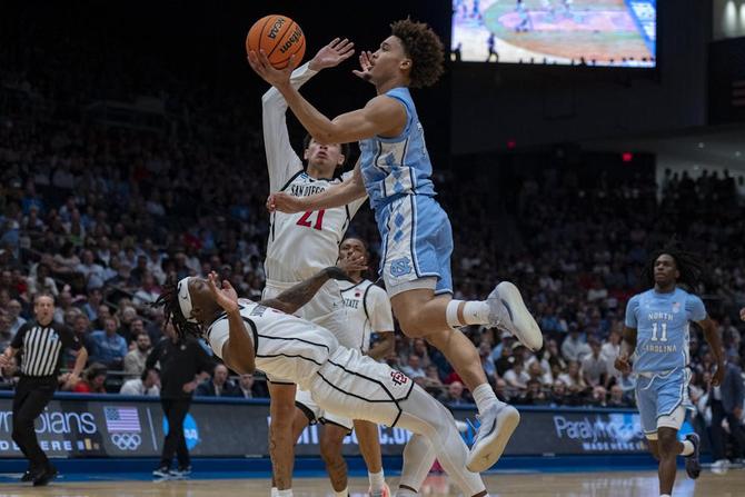 UNC Junior guard Seth Trimble (7) leaps toward the basket during the men’s basketball game against San Diego State University at the University of Dayton Arena in Dayton, Ohio