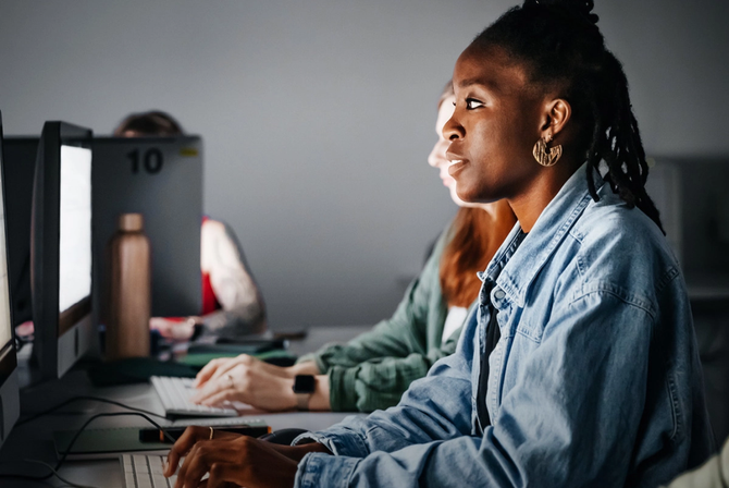A student looking at a computer
