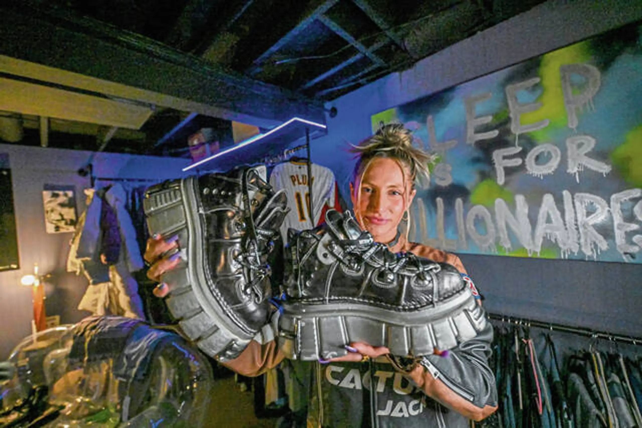 Sydney Bordonaro shows off a pair of boots. 