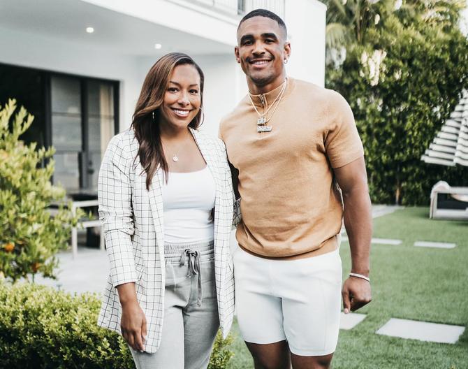 Agent Nicole Lynn poses with her client, Philadelphia Eagles quarterback Jalen Hurts.