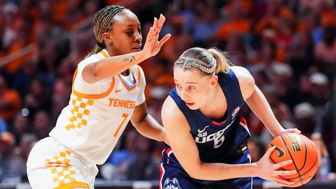 Tennessee guard Samara Spencer defends UConn guard Paige Bueckers.