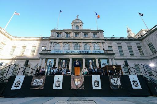 Gotham FC celebrates its 2025 NWSL Championship win outside of NYC City Hall.