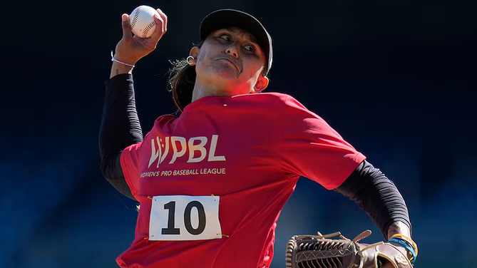 Kelsie Whitmore throws the ball.