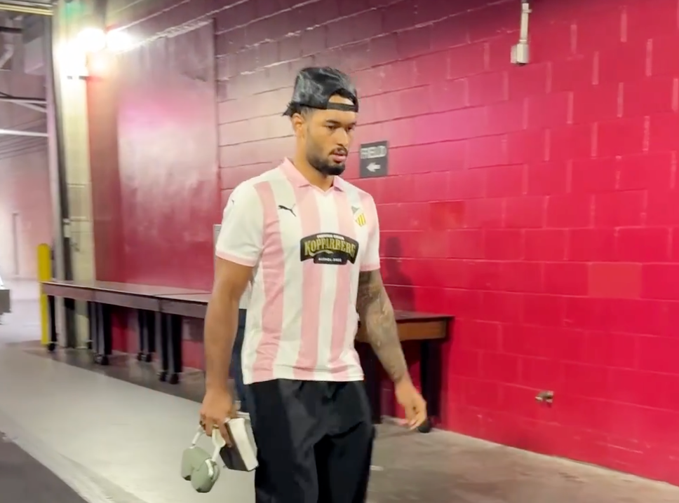 Tampa Bay Buccaneers wide receiver Emeka Egbuka wears his wife’s replica jersey.