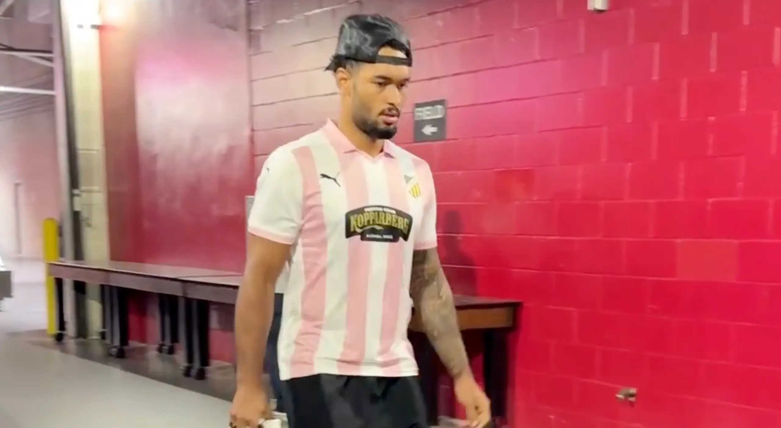 Tampa Bay Buccaneers wide receiver Emeka Egbuka wears his wifeâs replica jersey.