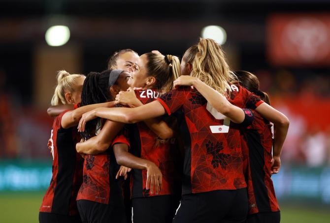 CanWNT celebrates after forward Jordyn Huitema’s goal.