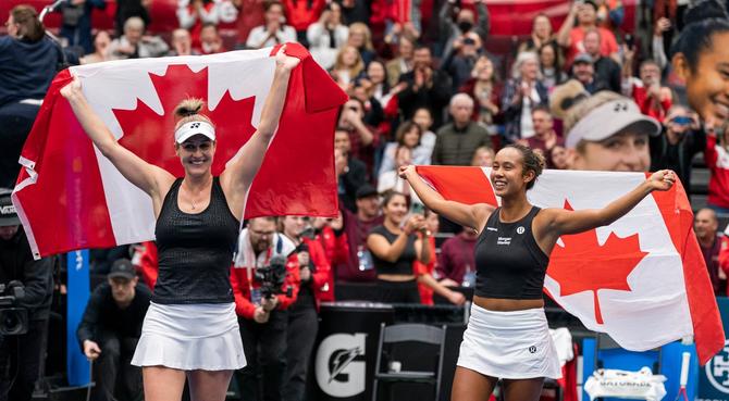 Leylah Annie Fernandez and Gabriela Dabrowski of Canada celebrate.