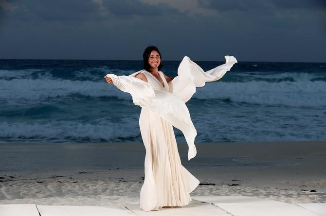 Ons Jabeur of Tunisia poses for a photograph on the beach at the Kempinski Hotel Cancun ahead of the WTA Finals draw ceremony prior to the GNP Seguros WTA Finals Cancun 2023 part of the Hologic WTA Tour on October 27, 2023 in Cancun, Mexico.