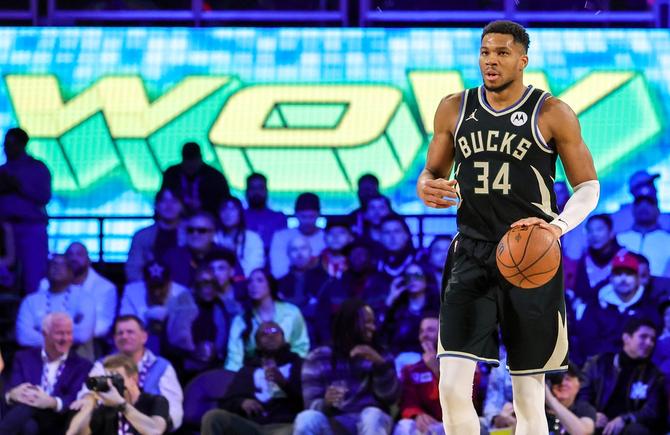 Giannis Antetokounmpo #34 of the Milwaukee Bucks brings the ball up the court.