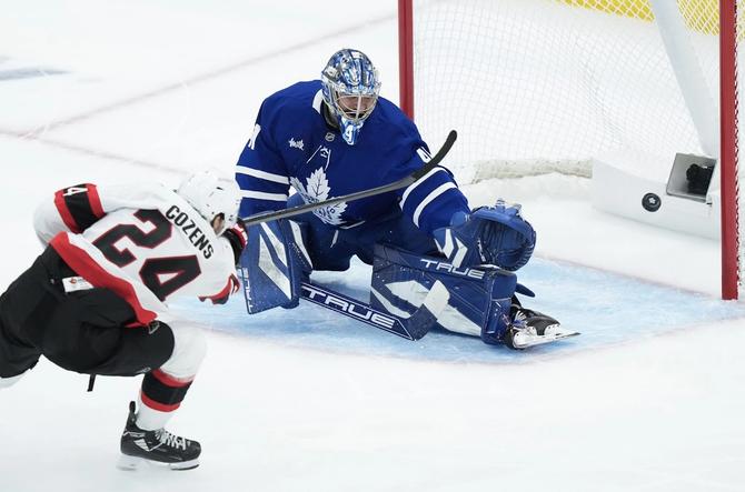 Ottawa Senators' Dylan Cozens scores a short handed goal against Toronto Maple Leafs goaltender Anthony Stolarz.
