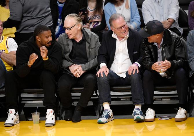 Michael B. Jordan, Bill Maher, David Zaslav, Chief Executive Officer and President of Warner Bros. Discovery, and Woody Harrelson, attend the Western Conference Semifinal Playoff game between the Los Angeles Lakers and Golden State Warriors at Crypto.com Arena on May 12, 2023 in Los Angeles, California.