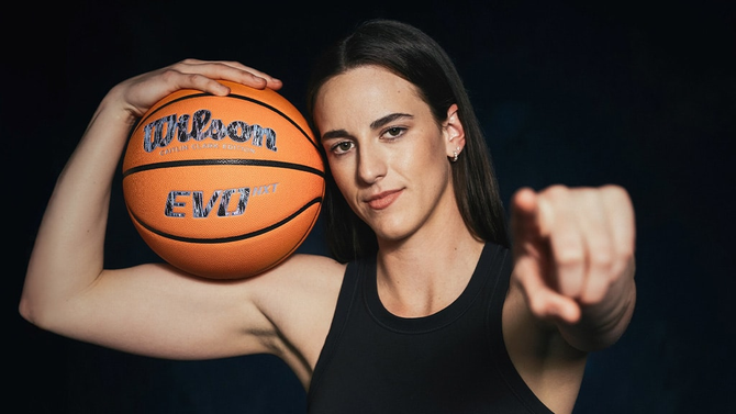 Caitlin Clark poses with Wilson basketball.