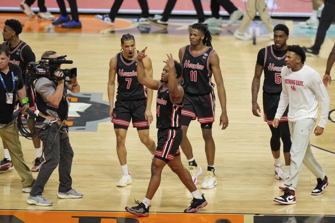 The Houston Cougars men’s basketball team celebrates their Final Four win over Duke.