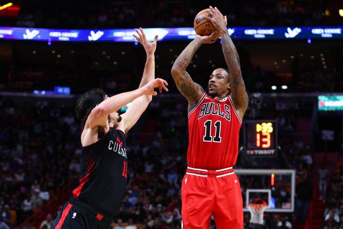 The Chicago Bulls’ DeMar DeRozan shoots the ball over the Miami Heat’s Jaime Jaquez.
