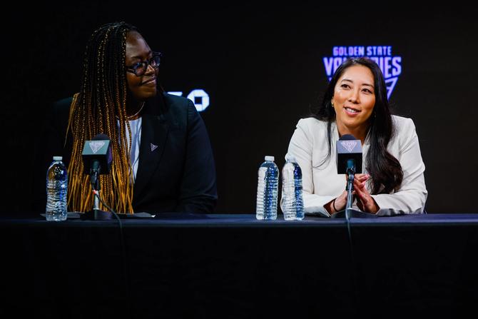 Golden State Valkyries General Manager Ohemaa Nyanin, left, announces their new head coach Natalie Nakase, formerly a first assistant coach with the 2-time WNBA Champions, the Las Vegas Aces, at Chase Center in San Francisco on Thursday, October 10, 2024. Nakase joined the Aces in February 2022 to help head coach Beck Hammon lead their team to back-to-back WNBA championships in 2022 and 2023 as well as the 2022 Commissioner's Cup title. Nakase is the first Asian coach to lead a WNBA team.