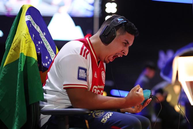 Paulo Henrique de Souza Ferreira Chaves (PHZin) of Brazil and AFC Ajax Brazil reacts in their semi final game against Mark Zakhary (Mark11) of Australia and Team FUTWIZ Australia during day four of the FIFAe World Cup 2023 on July 19, 2023 in Riyadh, Saudi Arabia.