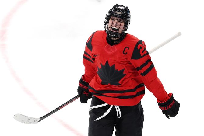 Marie-Philip Poulin celebrating on the ice