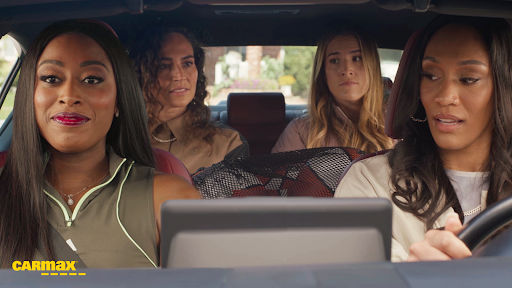 Sabrina Ionescu, Sue Bird, A'ja Wilson and Chiney Ogwumike sit in a car.