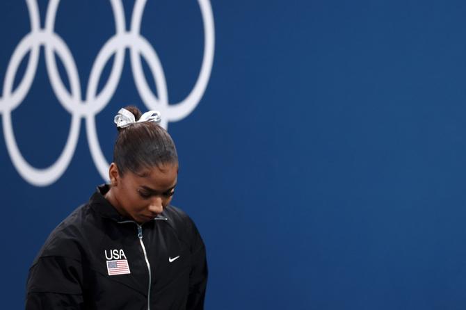 Jordan Chiles looks on before the floor apparatus.