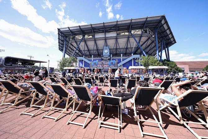 Fans sitting at the Fountain Plaza at the US Open
