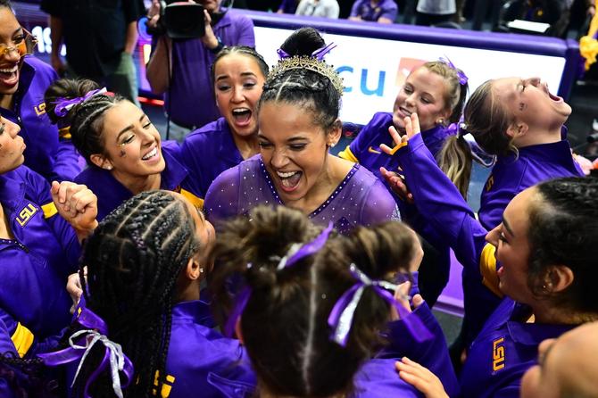 No. 3 LSU gymnast Haleigh Bryant celebrates a perfect 10 with her teammates in 2023.