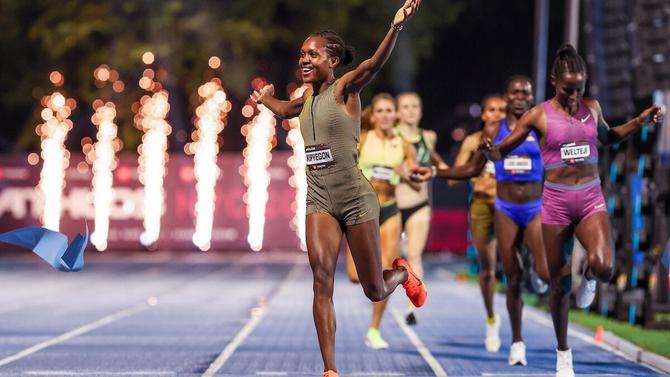 Faith Kipyegon crosses the finish line at Athlos NYC 2024.