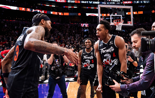 Toronto Raptors Scottie Barnes and Brandon Ingram celebrate after a win over the Charlotte Hornets.