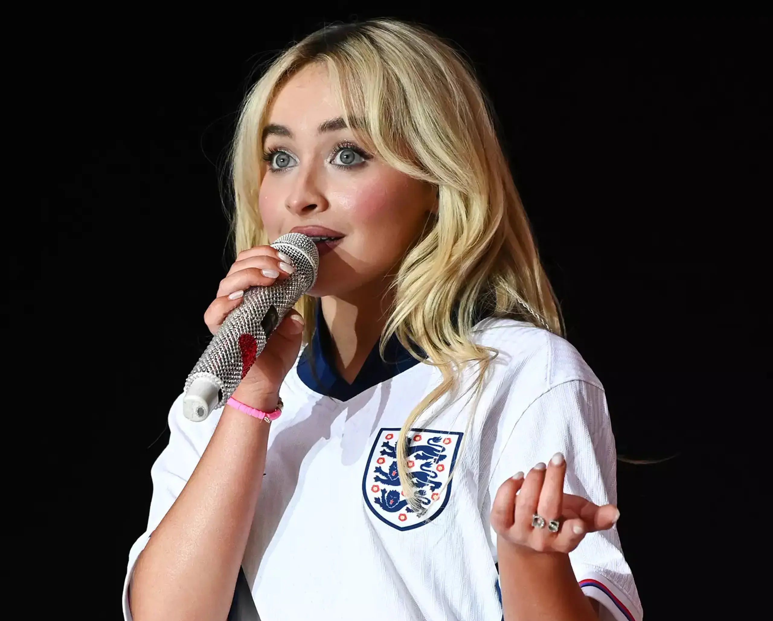 Sabrina Carpenter sports an England kit while performing at Capital’s Summertime Ball in Wembley Stadium in 2024