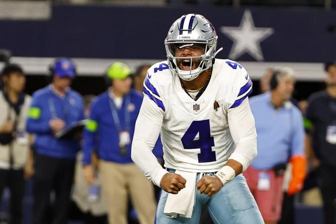 Dallas Cowboys quarterback Dak Prescott celebrates