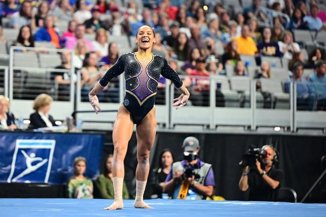 No. 2–seed LSU women’s gymnast Haleigh Bryant smiles as she completes her floor routine during last night’s national semifinal.