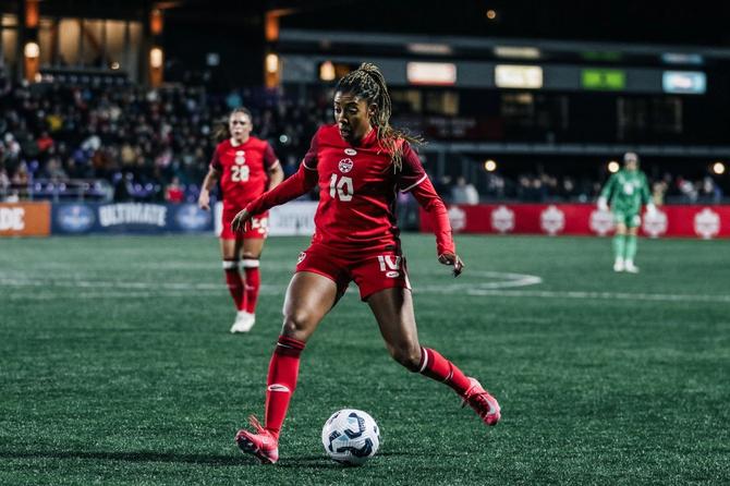 Canadian defender Ashley Lawrence plays the ball during a friendly.