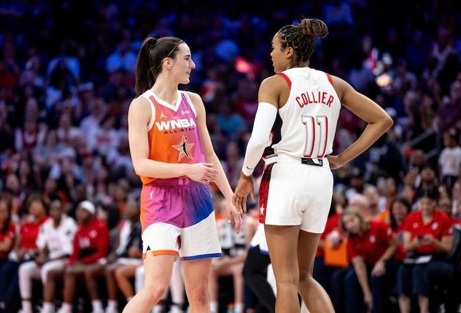 Caitlin Clark and Napheesa Collier talk on the court during the 2024 WNBA All-Star Game.