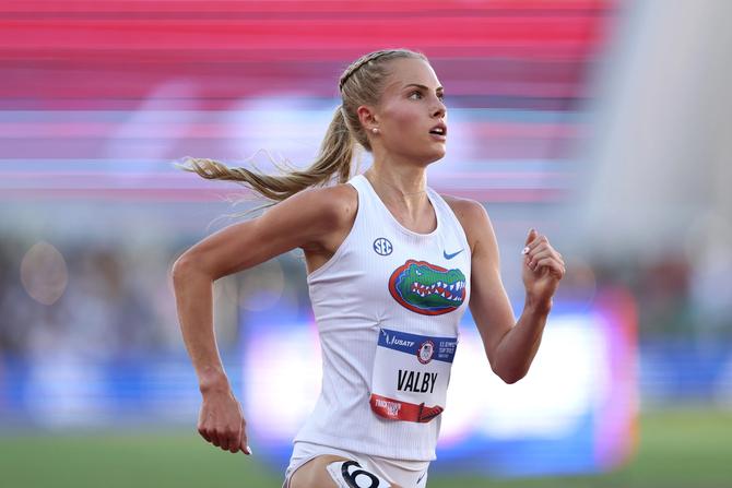 An action shot of Parker Valby running.