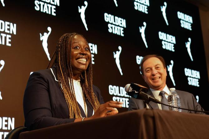 Warriors co-executive Chairman and CEO Joe Lacob, right, speaks at a press conference where Ohemaa Nyanin, left, is announced as the WNBA Golden State general manager at Chase Center on Monday, May 6th, 2024 in San Francisco, California.