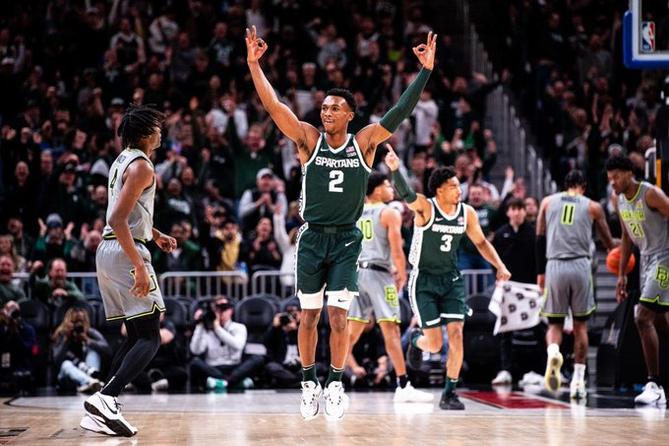 Michigan State men’s basketball guard Tyson Walker celebrates a bucket on December 16, 2023.