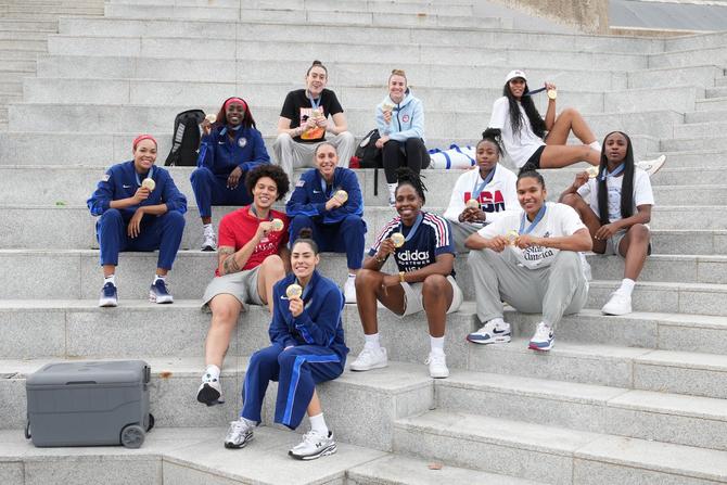 Team USA women’s basketball shows off their gold medals from the 2024 Paris Olympics.