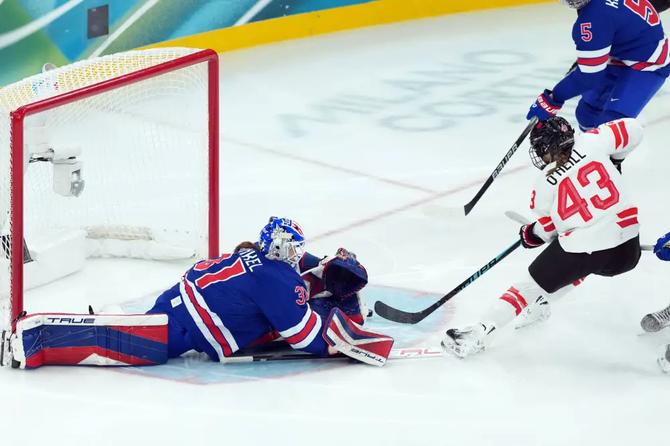 Team Canada’s Kristin O’Neill scores a shorthanded goal.