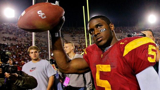 Heisman-winning running back Reggie Bush looks to the crowd after a USC win.