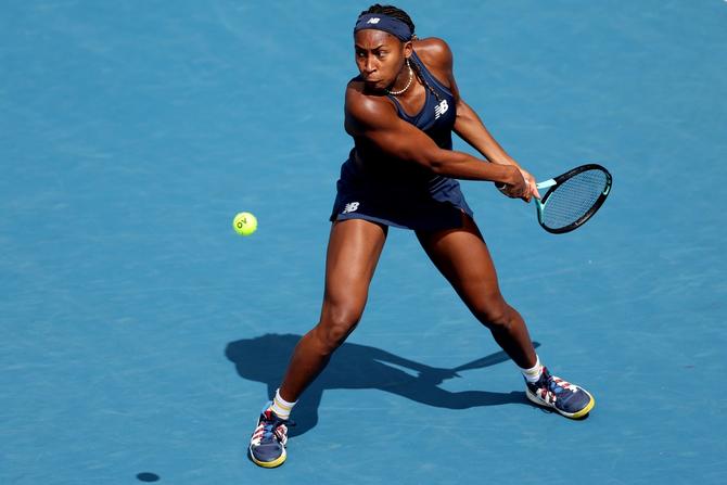Coco Gauff plays a backhand.
