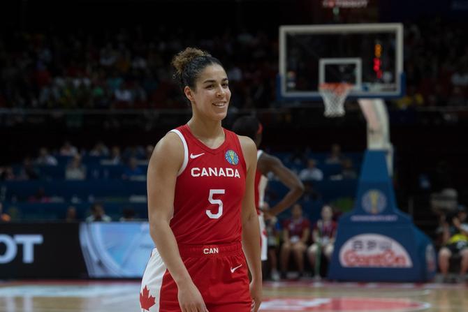 Kia Nurse smiling on the court
