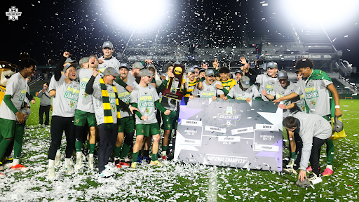 Vermont men’s soccer celebrates after winning its first national championship