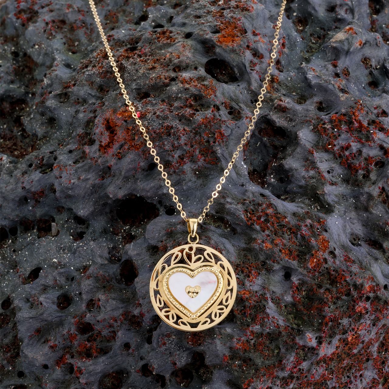 18K gold filigree heart pendant with white inlay