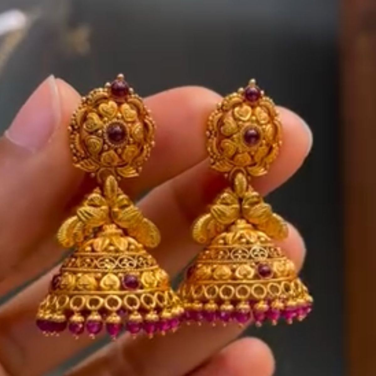 22K gold gold jhumka earrings with coloured stones and bead drops
