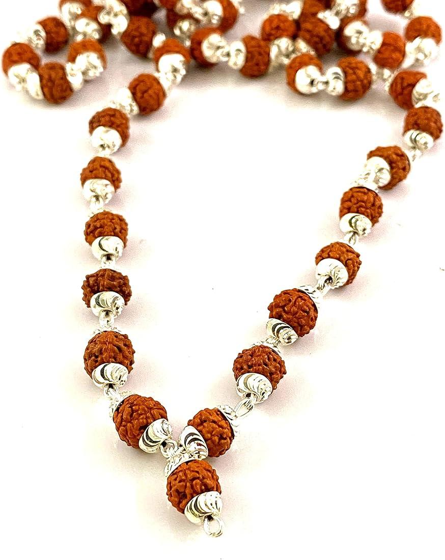 Close-up of a draped chain with textured Rudraksha beads and decorative silver-toned metal caps on a white background